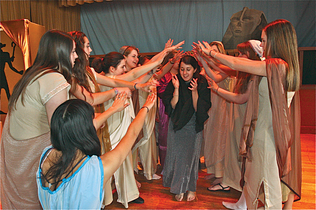 anielle Allen of Riverhead (center) as Aida in a scene with the other captured slaves. (Credit: Barbaraellen Koch)