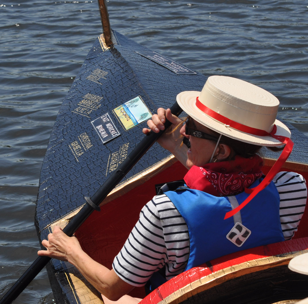 Robert Stiles Jr. and sister Barbara Aylward paddle to victory Sunday. (Credit: Grant Parpan)