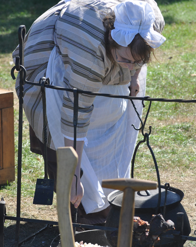 Cooking up a meal on the outskirts of camp. (Credit: Grant Parpan)