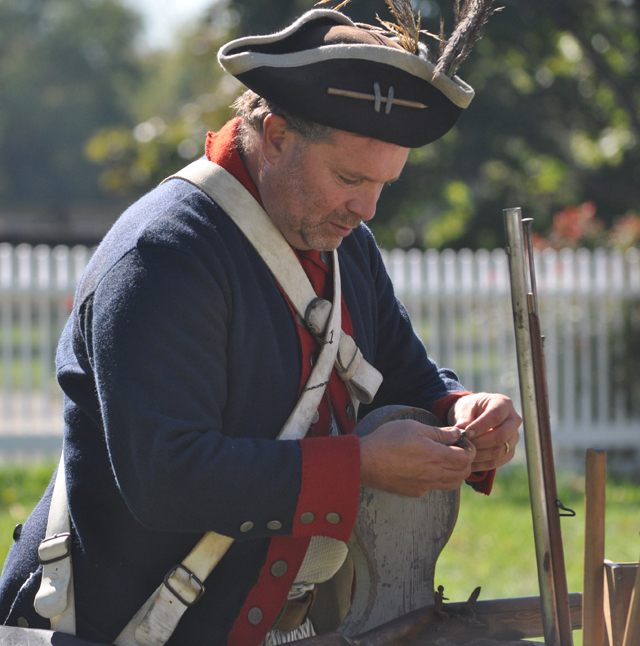 Quiet moments at the 1814 camp set up this weekend at Hallockville Museum farm. (Credit: Grant Parpan)