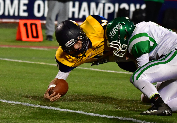 Chris Gray crosses the goal line for his first touchdown. (Credit: Robert O'Rourk)