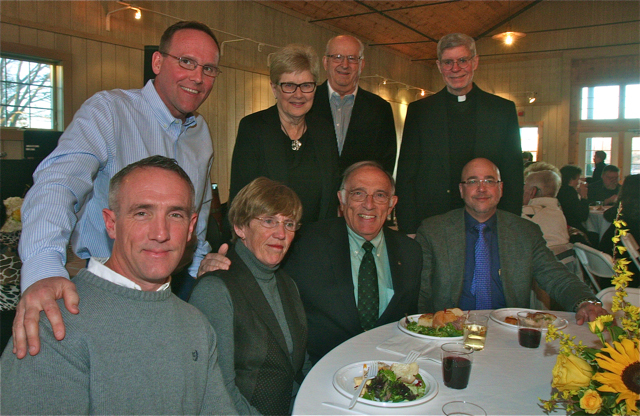 The Suffolk Times Public Servant of the Year, Ted Webb (second from right, seated) with family and friends. (Credit: Barbaraellen Koch)