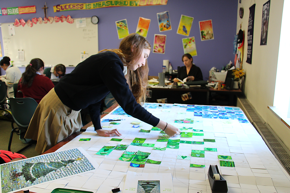 Maddie Joinnides, a sophomore at McGann-Mercy, lays out the main design for their Christmas card. (Credit: McGann-Mercy courtesy photo).