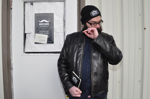 GIANNA VOLPE PHOTO  |  Co-owner Mike Spitz stands in front of the future site of Moustache Brewery in Riverhead's Polish Town on Tuesday afternoon.