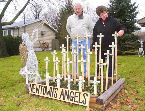 BARBARAELLEN KOCH PHOTO | Joe and Roe Czaluda's memorial to the Sandy Hook victims on their front lawn on Sunrise Avenue in Riverhead.