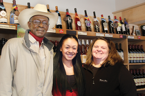 CARRIE MILLER PHOTO | Heather Riley (center ) with her parents Willie and Lori at Martha Clara Winery where they work.