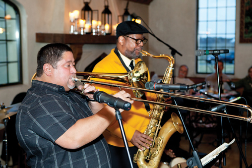 KATHARINE SCHROEDER FILE PHOTO  |  Papo Vazquez, left, with Willie Williams on saxophone at Raphael Vineyards during last year's Winterfest.
