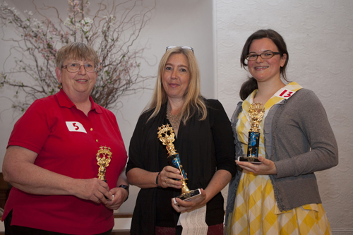 Spelling bee champion Sarah Bowe, center, with second-place winner Beth Motschenbacher, right and third-place winner Carol Cryzwinski. (Credit: Katharine Schroeder)