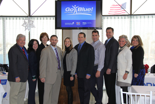CARRIE MILLER PHOTO | (left to right) Town Councilman John Dunleavy, Maureen O'Connor, program director of the Cancer Services Program of Eastern Suffolk County at Peconic Bay Medical Center, Dr. Claire Bradley, board president of American Cancer Society Eastern Division, Dr. Brett Ruffo, colorectal and general surgeon at PBMC, Sherry Patterson, chair of PBMC Health foundation, Joseph Abbate, colorectal cancer survivor, Dennis McDermott, owner of The Riverhead Project, Legislator Al Krupski, Janine Nebons, general manager of Tanger Outlets, and town councilwoman Jodi Giglio.