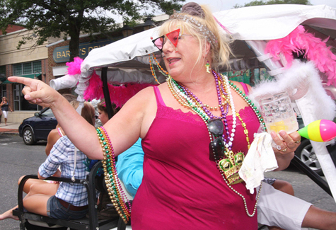 Chrissy Lessard of Riverhead marches in the parade.