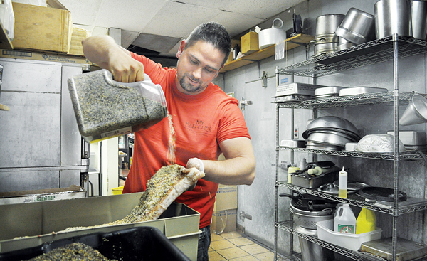 Patrick Gaeta preparing his North Fork Bacon last year. (Credit: Rachel Young, file)
