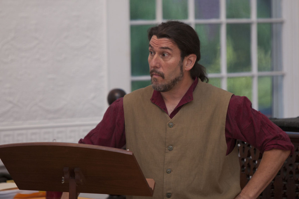 Moderator Jeff “Doc” Greenberger, a longtime Latin teacher at Riverhead High School. (Credit: Katharine Schroeder)