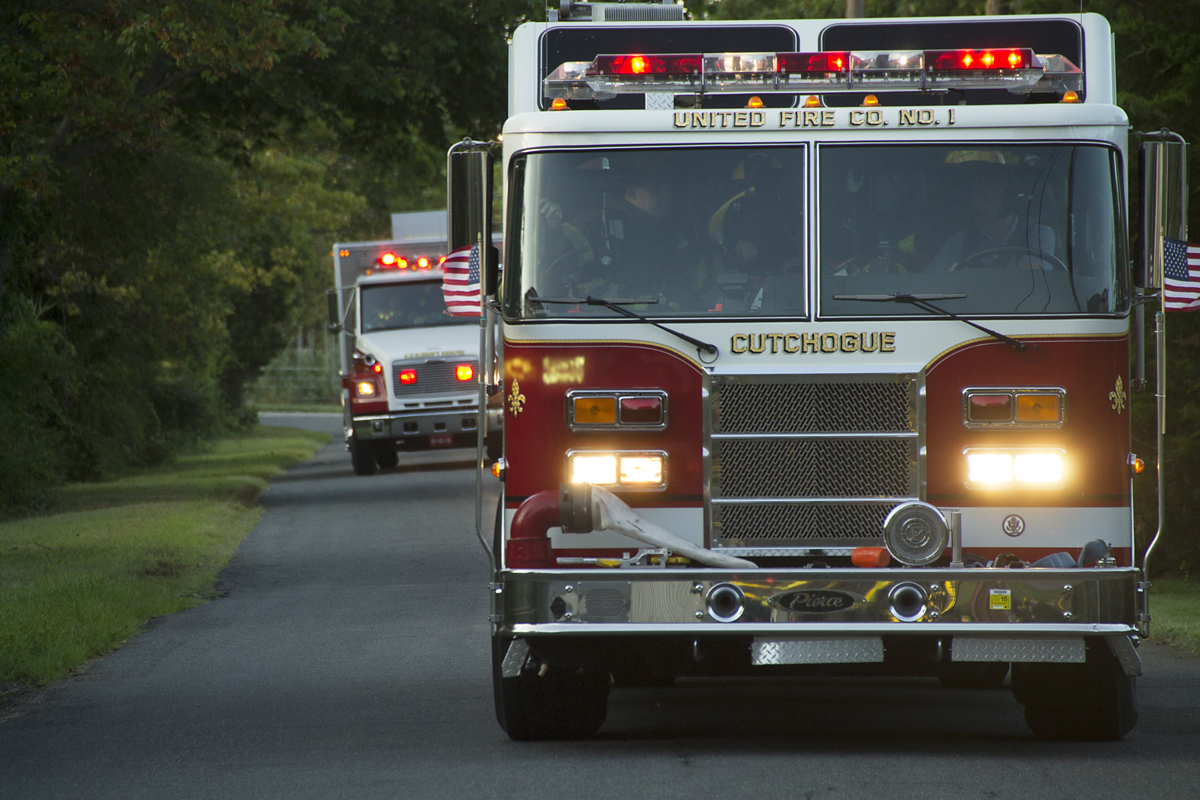 Fire trucks pour down Grathwohl Road to the scene of the drill. (Credit: Paul Squire)