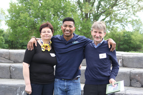 Mr. Castillo, center, with Lucas Pasko's parents, Danuta and Stanley. The amphitheater is dedicated in Lucas Pasko's memory.