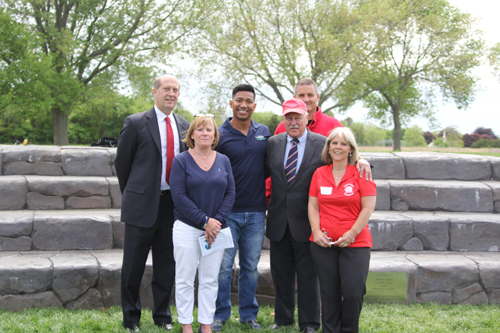 From left, Mr. Gamberg, school board president Paulette Ofrias, Mr. Castillo, state Senator Ken LaValle, school board member Scott Latham, and Ms. Fouchet.