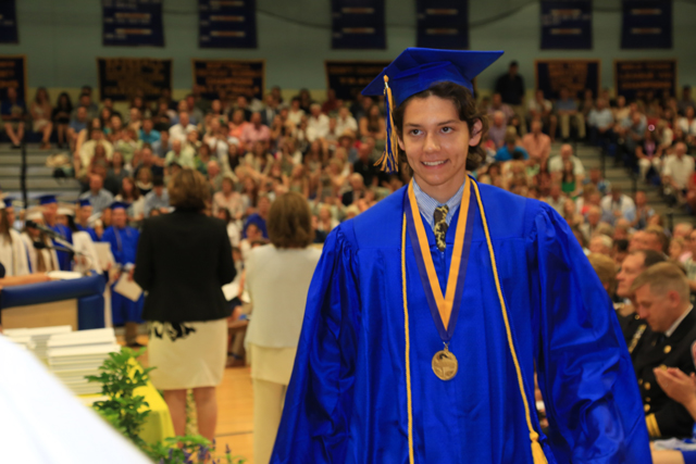 Salutatorian Jack Dufton after receiving diploma. (Credit: Krysten Massa)