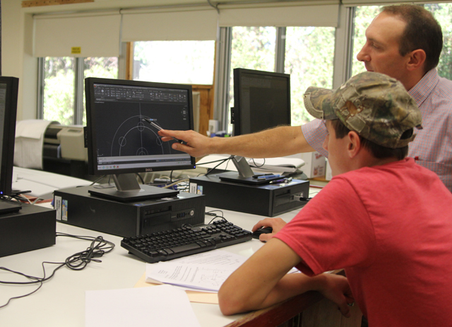 Mattituck teacher Steve Lavinio works with a student. (Credit: Jen Nuzzo)