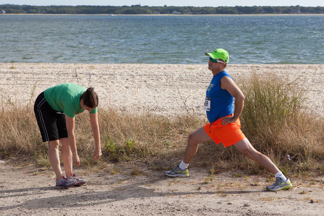 Runners stretching before race.