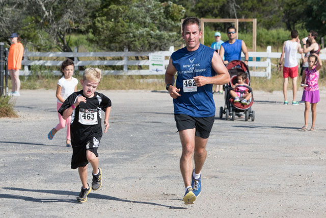 Runners approaching the finish line.