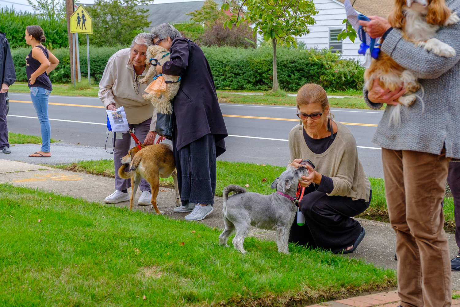 Cindy Raphael of Orient, right, with her mini schnauzer, Torhi. (Credit: Jeremy Garretson)