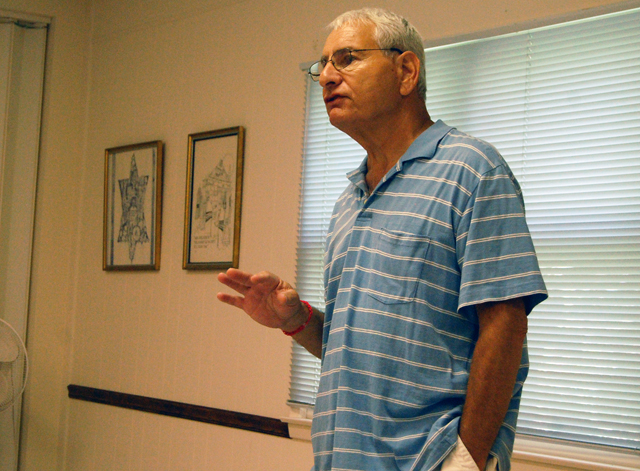 GRANT PARPAN PHOTO | Charles Millman speaks at Congregation Tifereth Israel in Greenport Sunday morning.