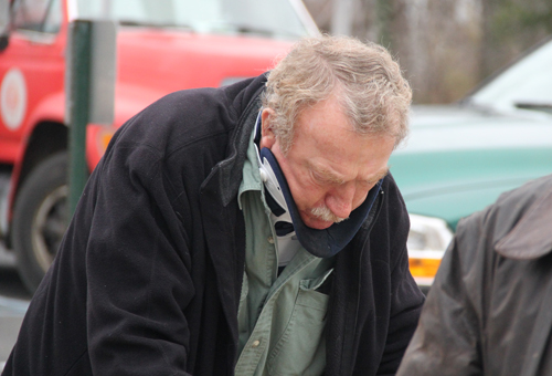 John Costello is led out of court Dec. 16. (Credit: Carrie Miller)