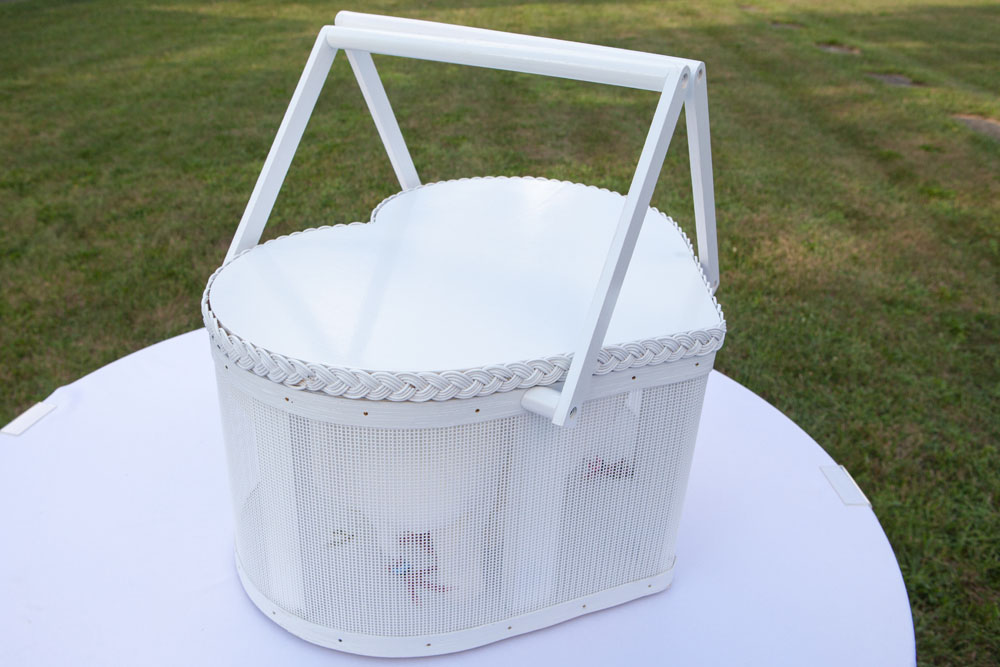 The heart-shaped basket containing four doves from Salt Air Farm in Cutchogue.