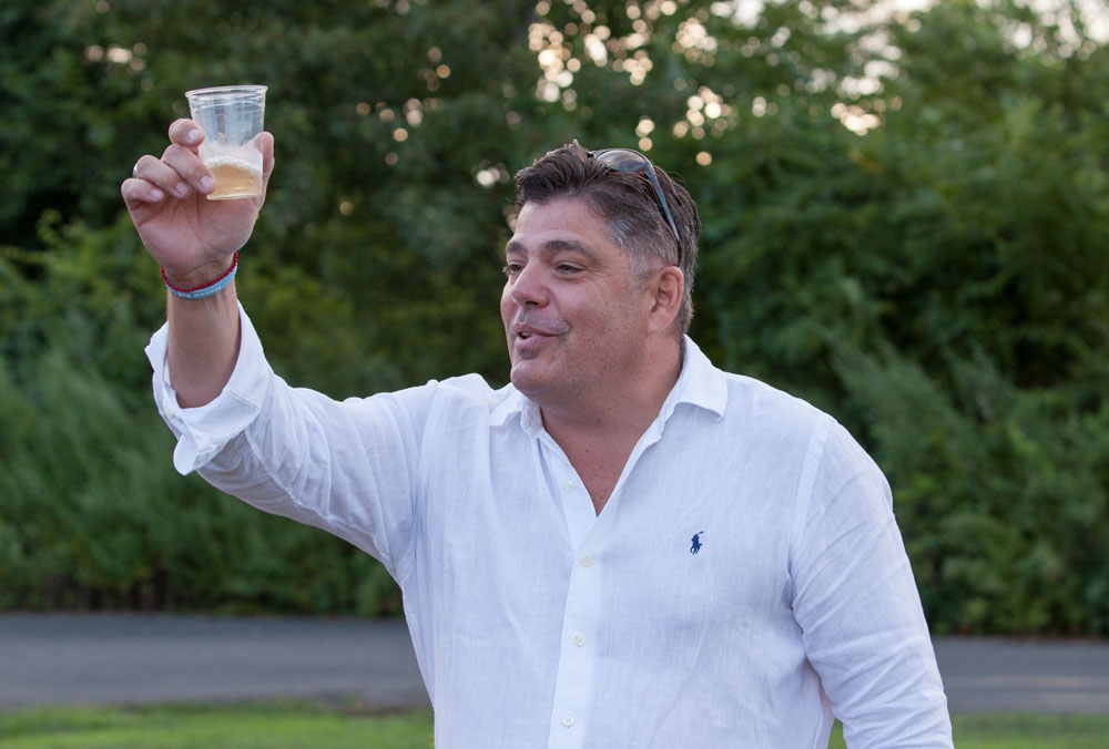 Chris Pia makes a toast.