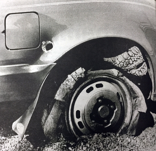 The marks of the two shotgun blasts fired by Douglas Cooper at a car carrying four teens in 1995. (Credit: Judy Ahrens, The Suffolk Times)