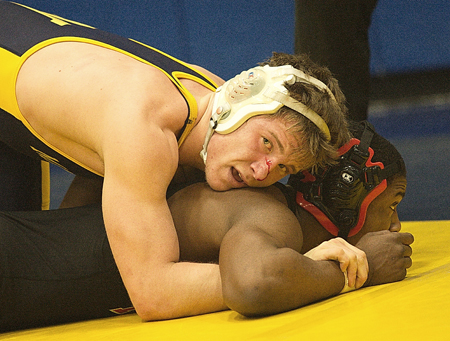 Filipkowski GARRET MEADE PHOTO | Mattituck junior Tomasz Filipkowski beat Maleik Henry of Hills East in the semifinals en route to his 170-pound title.