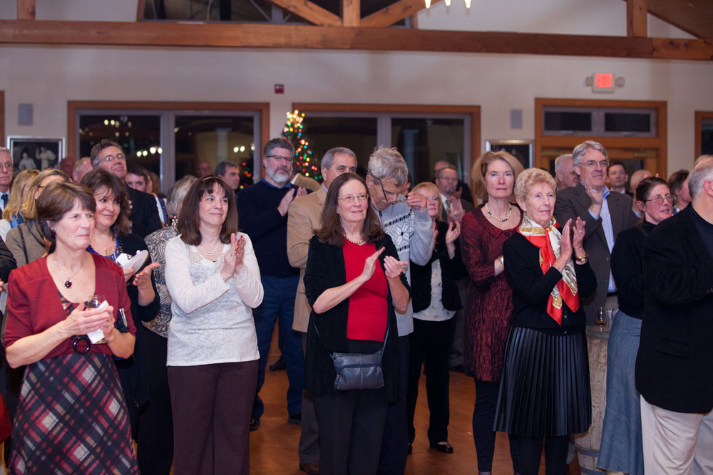 Friends and colleagues applaud Joe. (Credit: Katharine Schroeder)