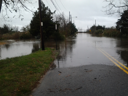 Goldsmiths inlet breached at Mill Lane in Peconic noon Monday