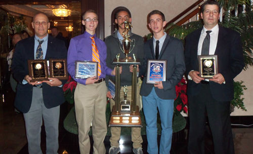 COURTESY PHOTO | From left, junior varsity coach Tom Taylor, Ryan Weingart, Byron Rivas, Eddie Rogers and coach Chris Golden show off awards they won, including the Suffolk County Soccer Officials Sportsmanship Award.