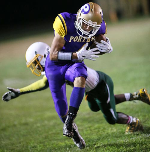 Jake Skrezec, who made three interceptions in his varsity debut for Greenport/Southold/Mattituck, returning a kickoff against Wyandanch. (Credit: Garret Meade)