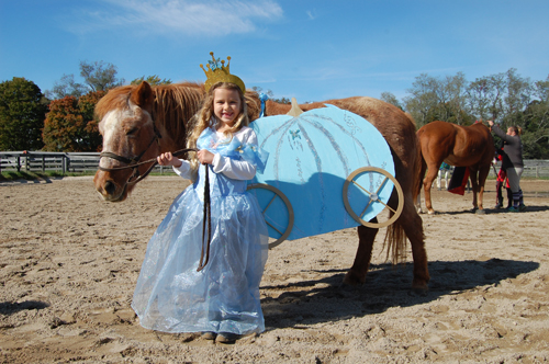 Elle O'Neill, 7, of Peconic won first place in a Halloween costume contest at Hedwig Farms in Laurel for her Cinderella-themed costumes.