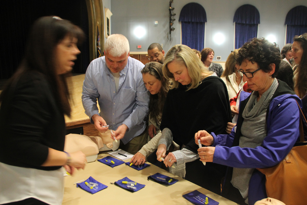 Community members learn how to use Narcan, an opiate overdose-reversing drug at Monday's presentation in Mattituck.
