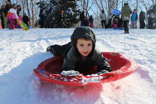 PAUL SQUIRE PHOTO | 4-year-old Chase from Jamesport picks up speed on a hill in Mattituck Sunday afternoon.