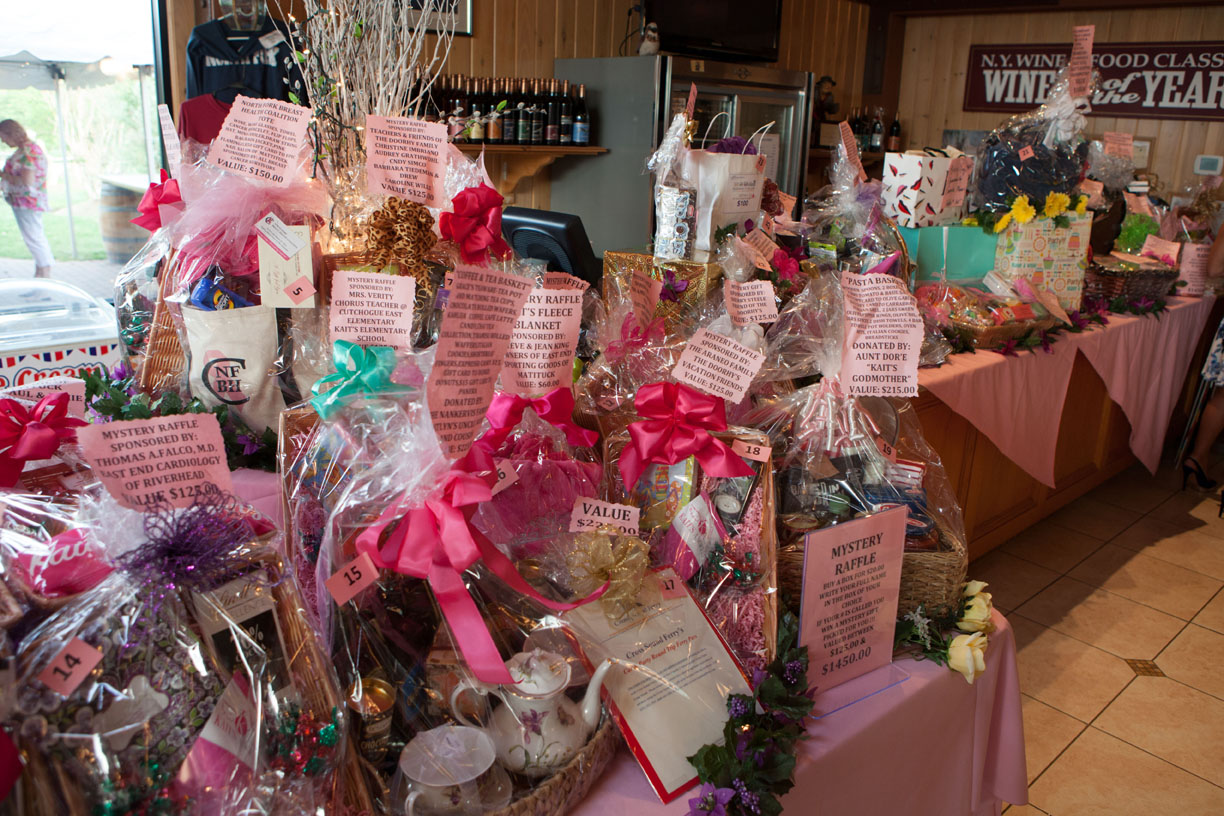 Tables overflowing with donated auction prizes. (Credit: Katharine Schroeder)