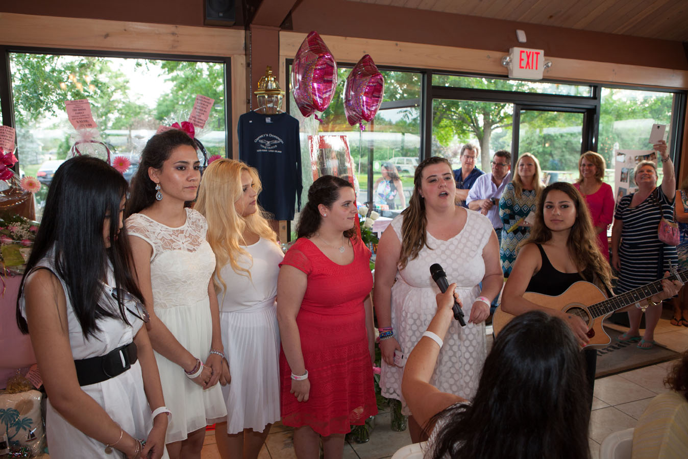 St. Joseph's College Show Choir sings Kait's favorite songs. (Credit: Katharine Schroeder)