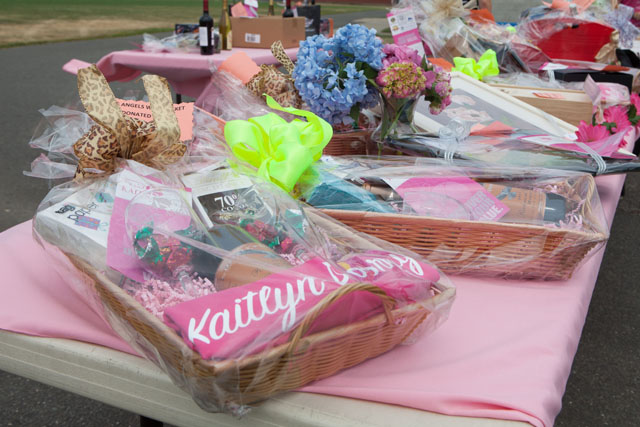 A table full of items for the mystery auction. (Credit: Katharine Schroeder)