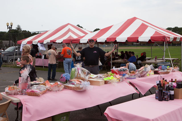 The auction table and food tents. (Credit: Katharine Schroeder)