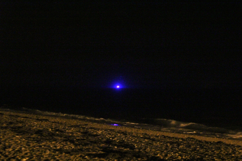 A boat off the shore of Orient Point at around 10 p.m. Wednesday night searching for two missing men floating on an inflatable raft. (Credit: Jen Nuzzo)
