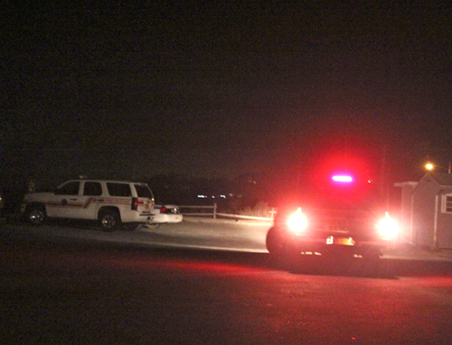Police and fire officials at Truman's Beach in Orient.