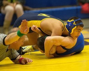 GARRET MEADE PHOTO | Bobby Becker of Mattituck/Greenport won his match at 138 pounds, pinning Josh Shaw of Smithtown Christian at 3 minutes 40 seconds.