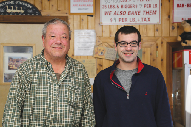 Mark Miloski Sr., left, and his son, Mark Jr., at their family farm in Calverton.