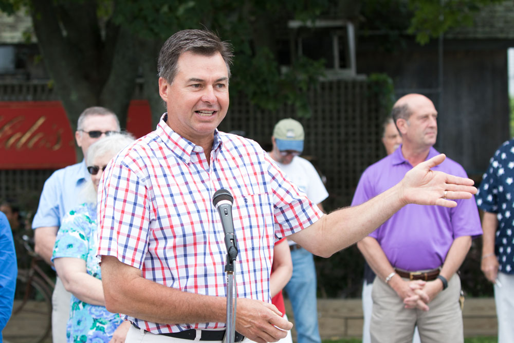 Legislator Al Krupski welcomes the ships to Greenport. (Credit: Katharine Schroeder)