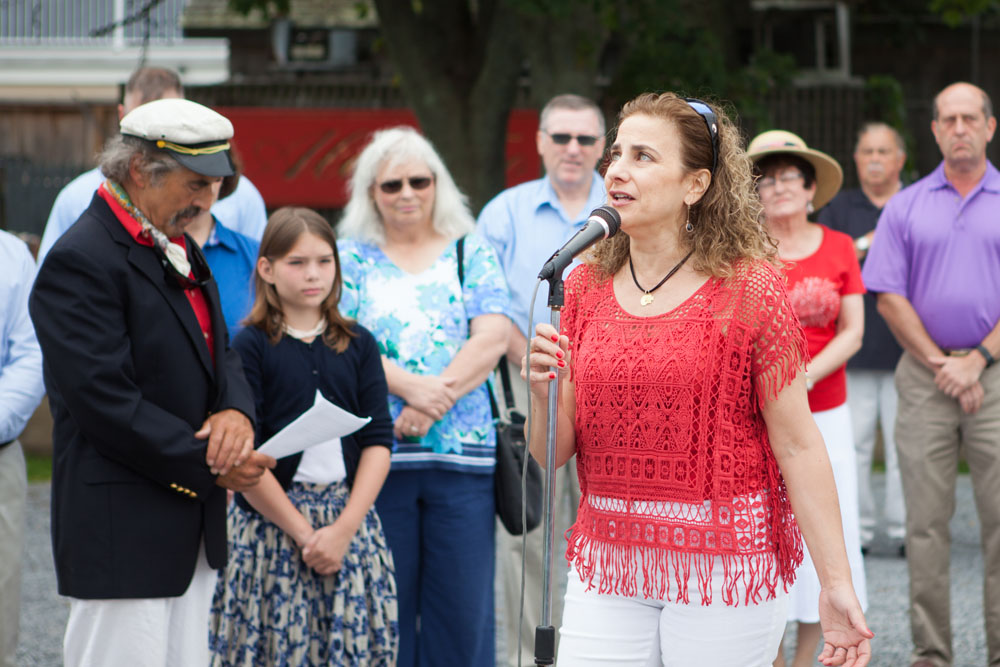 Roselle Borrelli of Greenport sings the national anthem. (Credit: Katharine Schroeder)