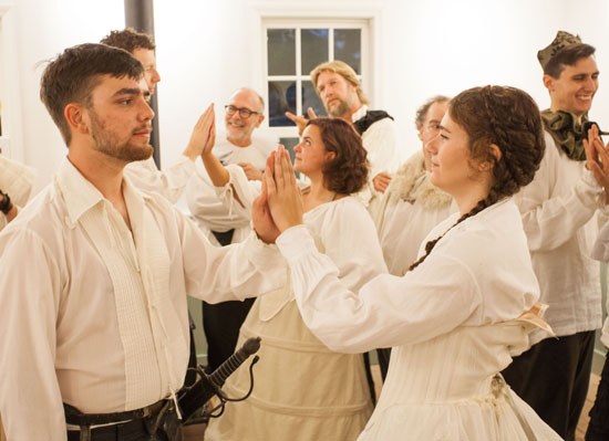 Oliver Orr as Orlando and Elena Faverio as Rosalind and the cast of 