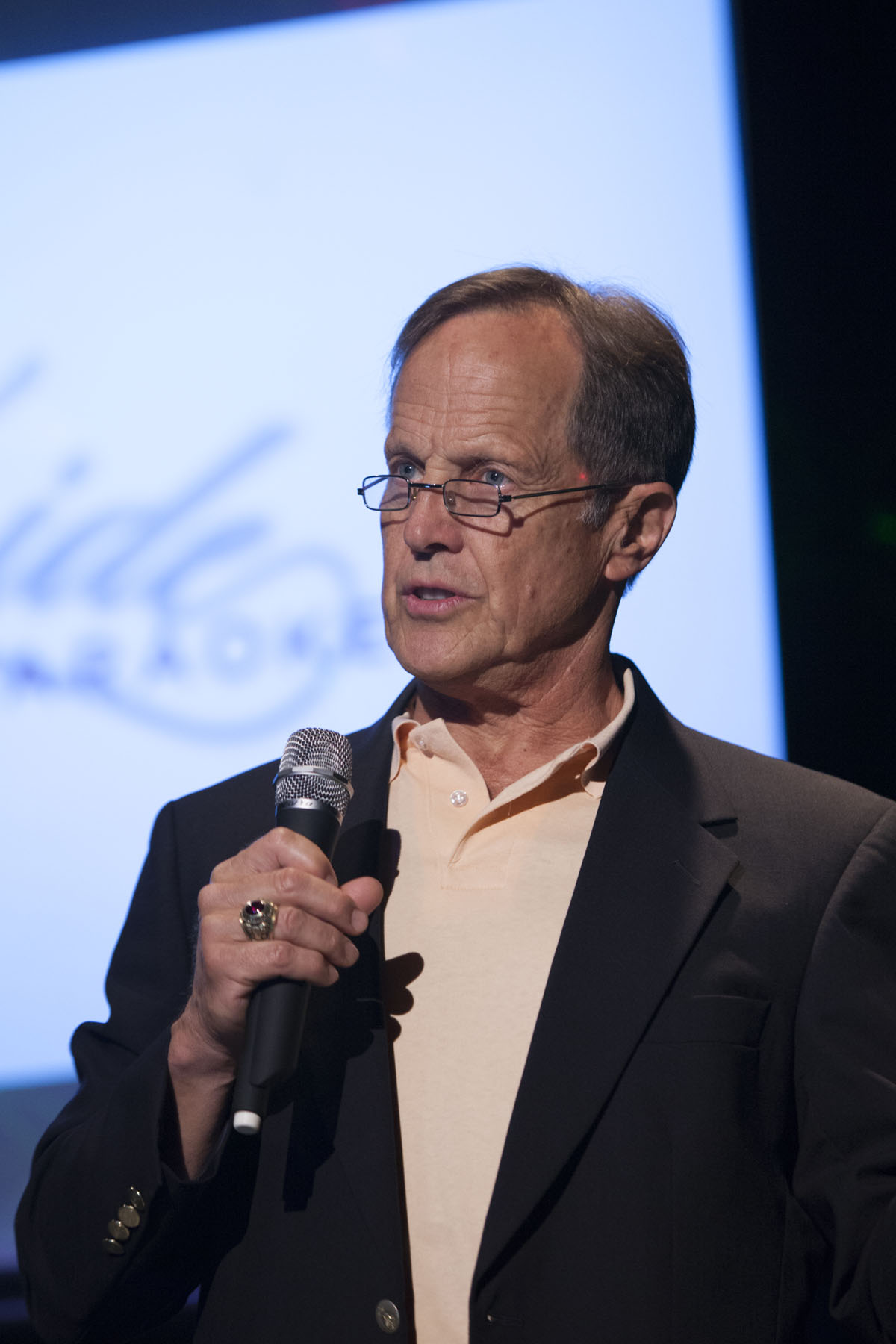 Former Suffolk County legislator Greg Blass speaks to the audience. (Credit: Katharine Schroeder)