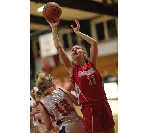 GARRET MEADE FILE PHOTO | Nicole Busso, one of Southold's five seniors, shooting over Pierson/Bridgehampton's Holly Zappola.